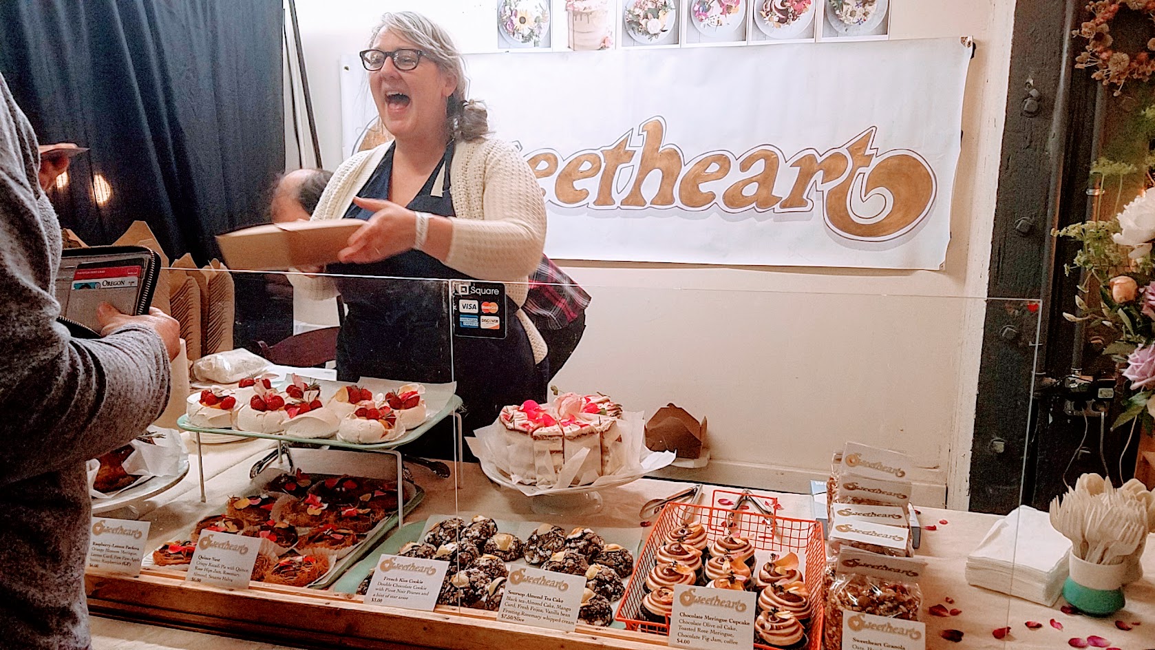 Sweetheart Bakery booth as part of the Portland Night Market, held every few months in the Central Industrial District in a warehouse, during the November 2016 market