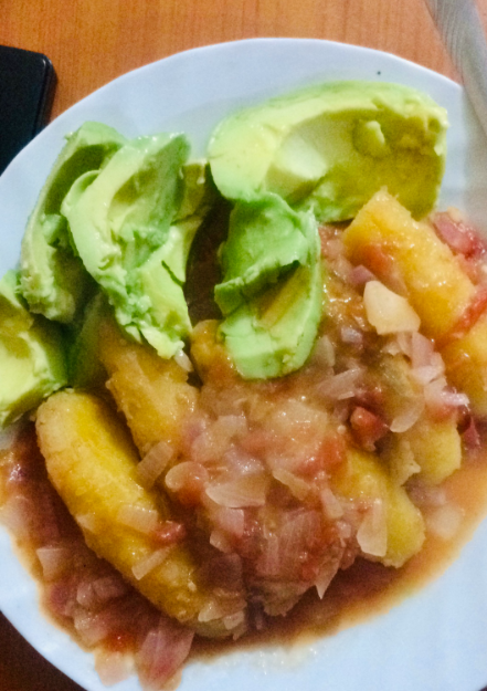 A plate of matoke served with avocado