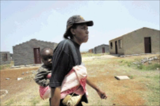 GOING NOWHERE: Lidia Veldman is one of alleged illegal occupants of Eden Park Extension 5 . 05/11/08. Pic. Antonio Muchave. © Sowetan.