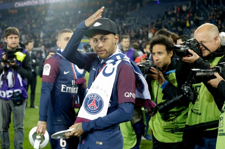Neymar Jr of Paris Saint Germain celebrates the championship during the French League 1 match between Paris Saint Germain v Rennes at the Parc des Princes on May 12, 2018 in Paris France.