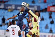 Hlompho Kekana of Mamelodi Sundowns and Khanya Mini of EC Bees during the Nedbank Cup, Last 16 match between Mamelodi Sundowns and EC Bees at Loftus Stadium on March 13, 2018 in Pretoria. 
