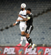 Tasherrq Morris of Cape Town City challenged by Thulani Hlatshwayo of Orlando Pirates. 