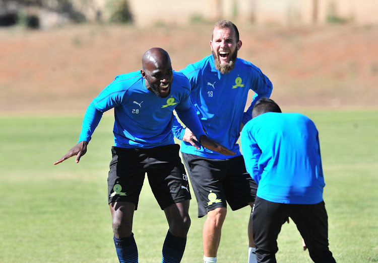 Mamelodi Sundowns striker Anthony Laffor (L) and Jeremy Brockie (R) share a funny moment during the club's media day and press conference at Chloorkop, Pretoria on July 25 2018.