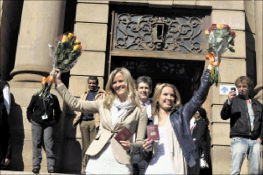 free at last: Dutch citizens Barbara Castelein and Mirthe Nieuwpoort after their ambush marketing charges were dropped in the Johannesburg magistrate's court yesterday. Pic: BAFANA MAHLANGU. 22/06/2010. © Sowetan. 20100622 BMA Dutch citizens Barbara Castelein and Mirthe Nieuwpoort appeared at the Johannesburg Magistrates Court on ambush marketing charges stemming from a Netherlands vs Denmark World Cup match. Charges were dropped after FIFA and Dutch Bavarian Brewery reached an out of court settlement. PHOTO: BAFANA MAHLANGU