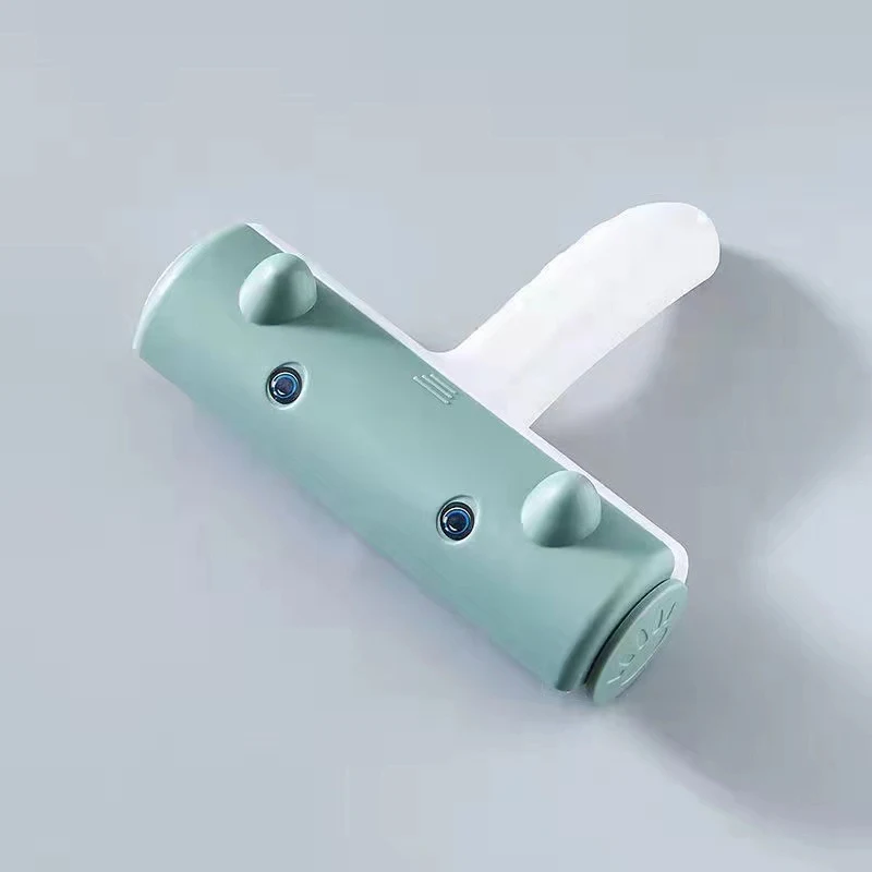 Éliminateur de poils de chat et chien bidirectionnel. Nettoie efficacement les poils d'animaux. Parfait pour meubles et textiles.