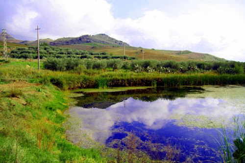 Le nuvole, il lago, la campagna di Tikotako