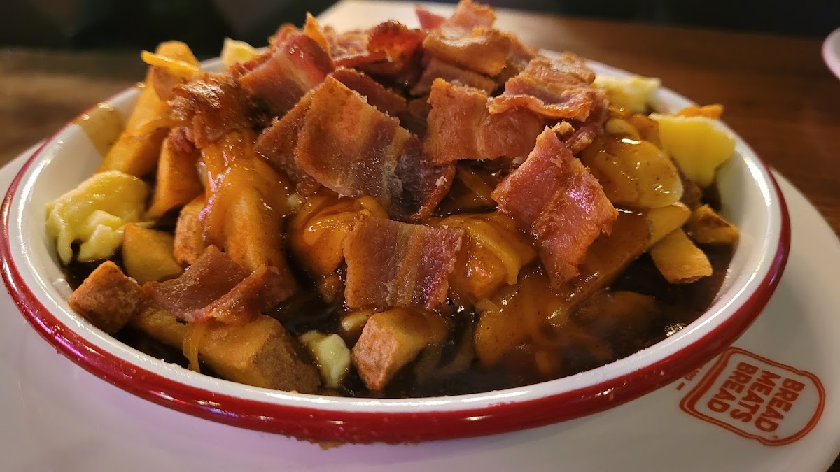 Ras-Poutine with fries, gravy, mozzarella, cheddar & bacon