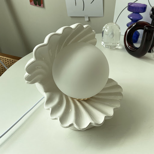 Title 5, Shell Ceramic Table Lamp provides elegant light...