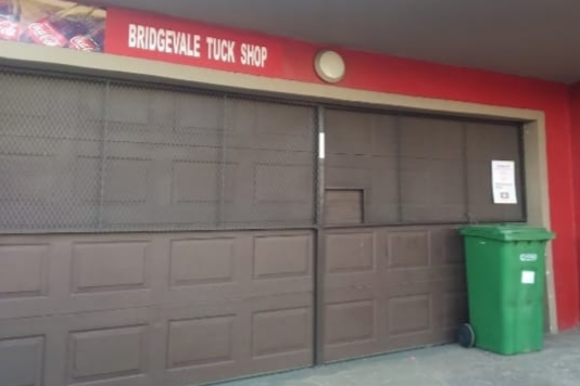 Bridgevale Tuck Shop's customers often buy basic supplies on credit. The owner has written off their debt to help them survive the financial impact of the violent protests that rocked KwaZulu-Natal.