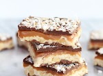 Toasted Coconut Caramel Peanut Butter Snickers Bars was pinched from <a href="http://www.halfbakedharvest.com/toasted-coconut-caramel-peanut-butter-snickers-bars/" target="_blank">www.halfbakedharvest.com.</a>