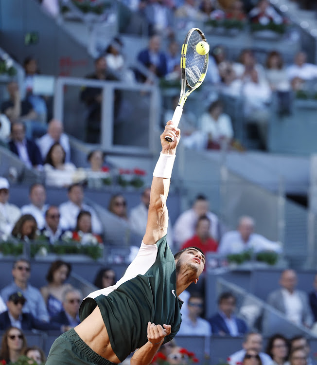 Spain's Carlos Alcaraz Garfia in action against Germany's Alexander Zverev during the final match of the Madrid Open