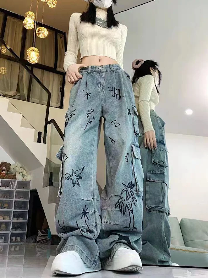 Retro Cartoon Graffiti Loose Denim Trousers for Women offer a comfortable, relaxed fit and a trendy, eye-catching style 