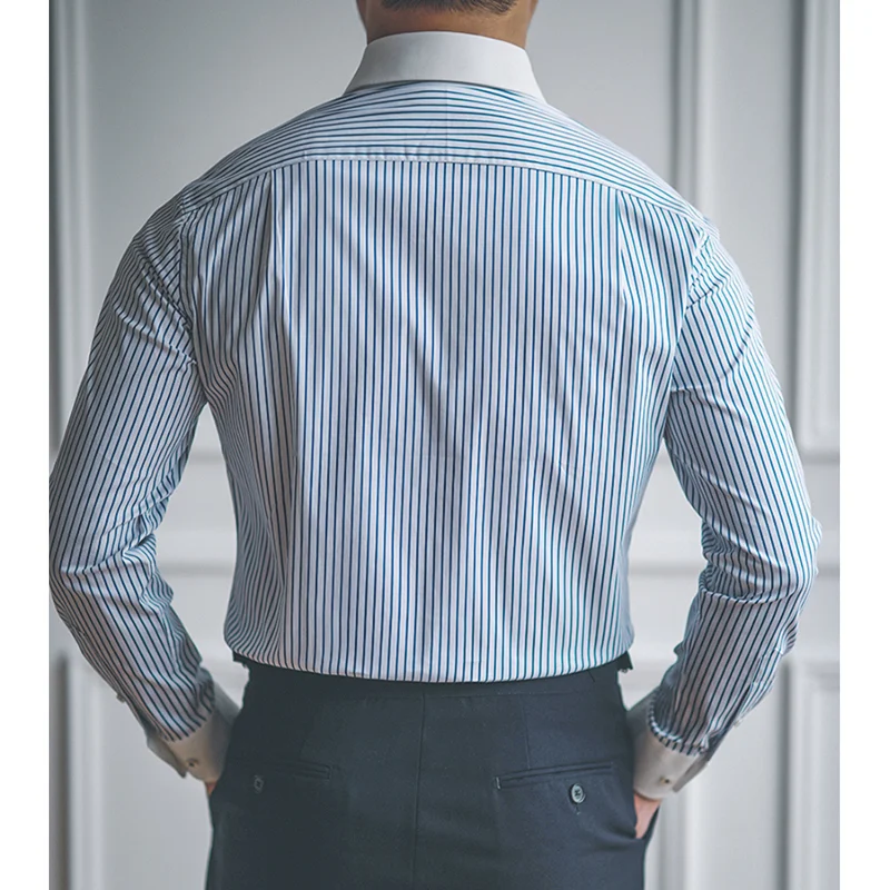 Chemise homme coupe slim fit, col pointu, manches longues, disponible en plusieurs couleurs. Élégance et confort pour toutes occasions.