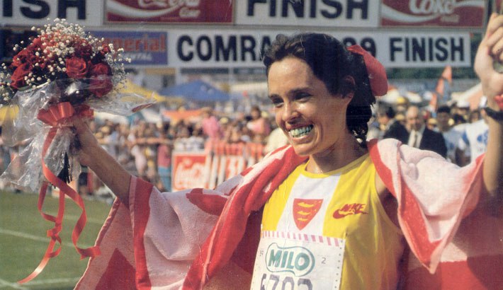 Frith van der Merwe celebrates her extraordinary 1989 Comrades win. Van der Merwe finished 15th overall and her 5hr 54 min 43 sec down run record still stands today.