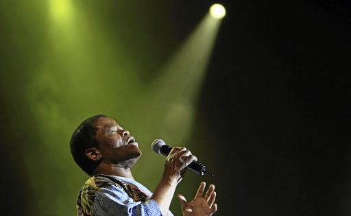 Joseph Shabalala, ex-singer and leader of Ladysmith Black Mambazo, performs at the International Music Festival held at the ICC in Durban.