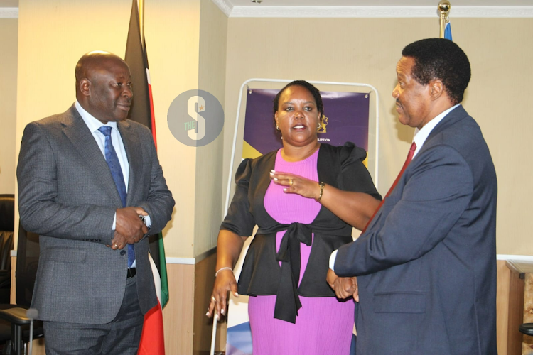 Ministry of Labour and Social Protection Cabinet Secretary Florence Bore, Social Protection and Senior Citizens Affairs PS Joseph Motari and EACC commissioner Alfred Mshimba interact during the launch of a joint compliance monitoring of the Inua Jamii cash transfer programme at NSSF offices, Nairobi on March 6, 2024.