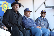 Police minister Bheki Cele, national commissioner Fannie Masemola and Gauteng police commissioner Elias Mawela at Mdlalose Tavern, where 15 people were killed by unknown gunmen in Orlando East, Soweto. 