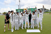 The Dolphins celebrate winning the CSA 4 Day Domestic Series, Division 1 title. 