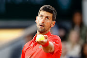 Novak Djokovic of Serbia serves in the match against Yoshihito Nishioka of Japan at the French Open at Roland Garros in Paris on May 23 2022.