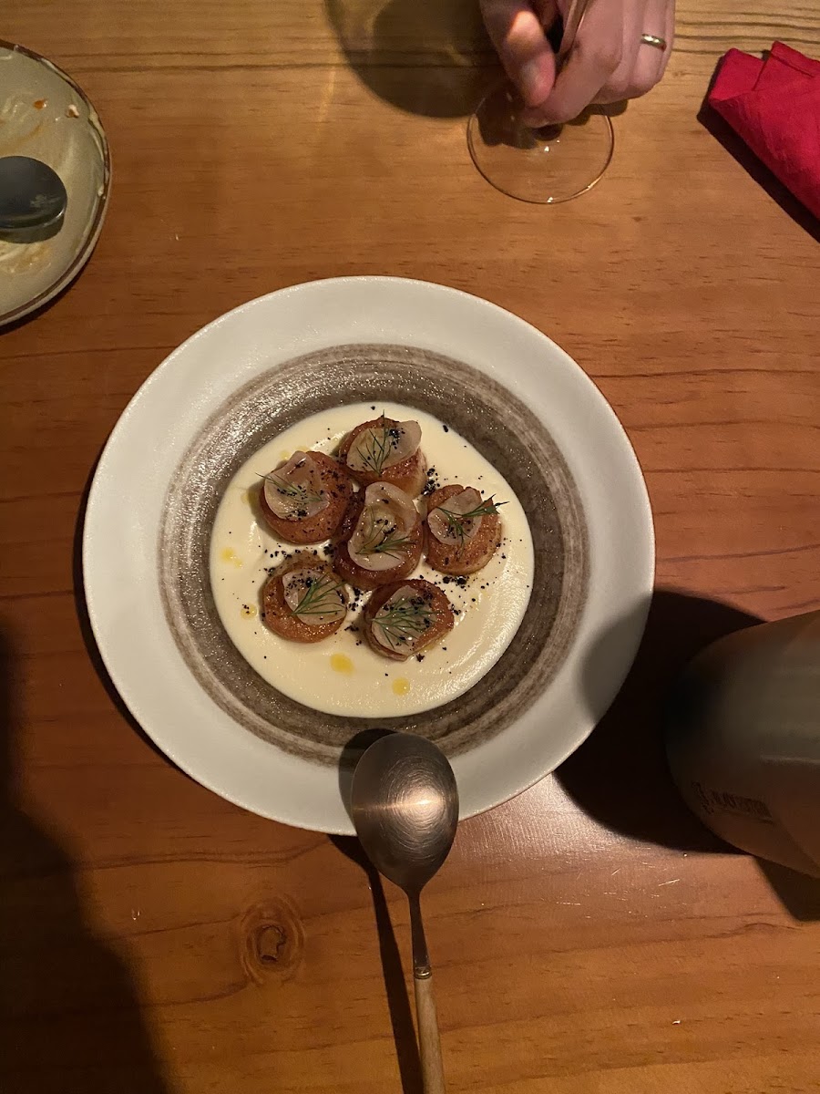 Chargrilled scallops with cauliflower and white bean puree