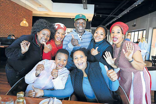 CELEBRATED: Six out of nine women honoured an anonymous invite to a Gonubie restaurant courtesy of Budgie Mokoena, a petrol attendant, who wanted to treat the women who have made an impact on his life Picture: STEPHANIE LLOYD