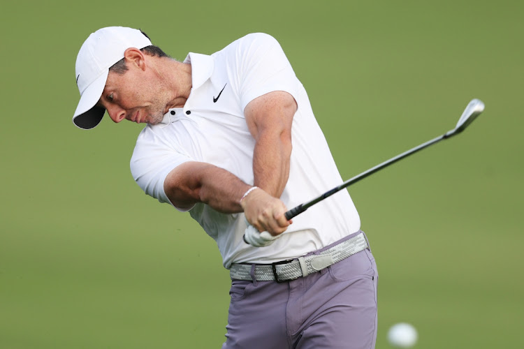 Rory McIlroy of Northern Ireland plays his second shot on the 10th hole during round one of the Hero Dubai Desert Classic at Emirates Golf Club on Thursday. Picture: WARREN LITTLE/GETTY IMAGES