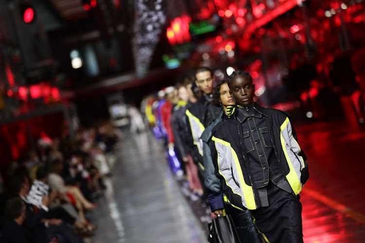 Maty Fall Diba walks the runway at the fashion debut of the first co-ed Ferrari collection at Ferrari Factory on June 13 2021 in Maranello, Italy.