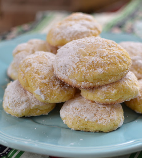 These easy Lemon Gooey Butter Cookies are seven ingredient cookies that just melt in your mouth.  With the ease of a lemon cake mix these cookies come together quickly and easily.