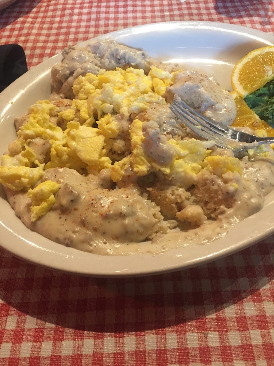 Homemade biscuits and gravy— added scrambled eggs on top!! Amazing!