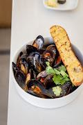 Mussels with garlic, cream, spice and lemon.