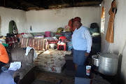 CRAMPED: Segomotso Thapedi  and her family of 11 are living in a single room after their house was flattened by a tree