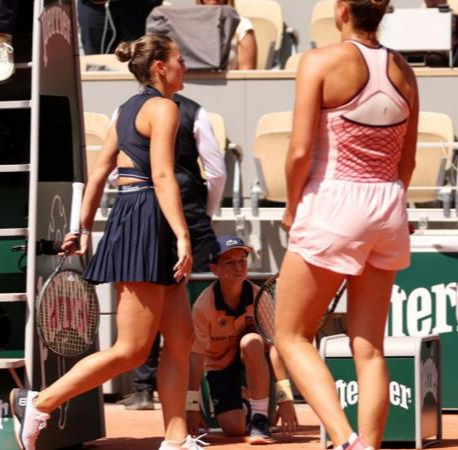 Marta Kostyuk (left) refuses to shake hands with Aryna Sabalenka