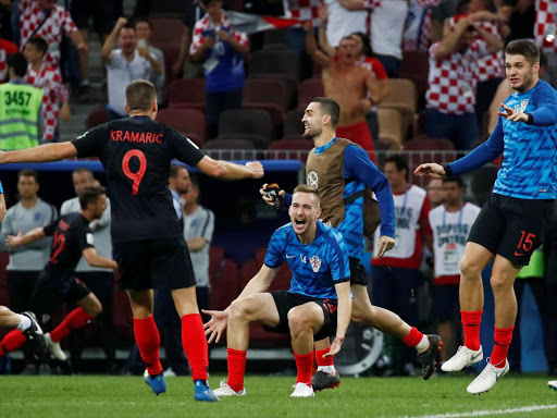 Soccer Football - World Cup - Semi Final - Croatia v England - Luzhniki Stadium, Moscow, Russia - July 11, 2018 Croatia's Andrej Kramaric, Filip Bradaric and Duje Caleta-Car celebrate after the match REUTERS