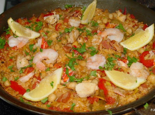 With a squeeze of lemon over the top, this paella is absolutely delicious!!! YUM YUM YUM 