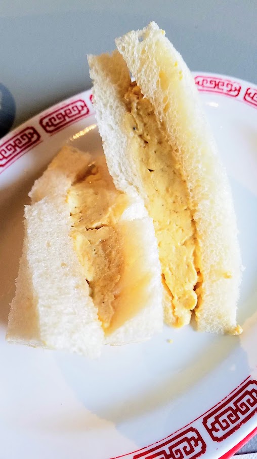 Hong Kong Style Scrambled Egg sandwich with fluffy milk bread, soft scramble chicken egg, American cheese. Optional Sichuan pork heart ragu which I opted out of. Gado Gado Portland Breakfast pop up at Guilder during MLK weekend 2019