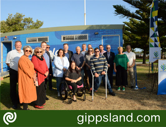 Disability advocates Bianca Basset and Steve Fletcher (front), joined members of Lakes Entrance community groups, Councillors and senior officers from Maroondah City Council and East Gippsland Shire Council to celebrate the handover of a Marveloo