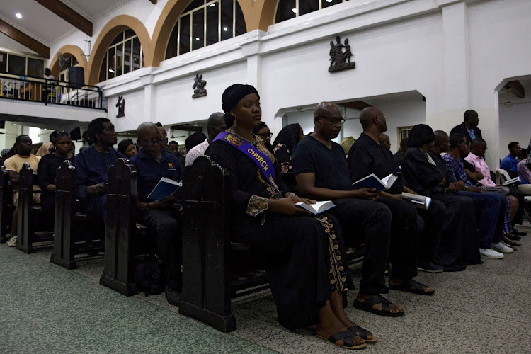 People attend Ash Wednesday mass inside the Church of the Assumption in Ikoyi district in Lagos, Nigeria on February 26, 2020. Nigeria's Lagos state has suspended plans to reopen places of worship.