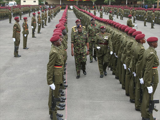 President Uhuru Kenyatta inspects a guard of honour mounted by General Service Unit (G.S.U.) Recruits during their Passing Out Parade at the G.S.U. Training School in Embakasi, Nairobi. Photo/PSCU