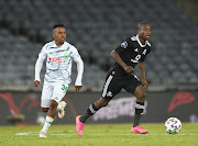 Siphesihle Maduna of AmaZulu challenges Ben Motshwari of Orlando Pirates during the DStv Premiership 2020/21 match between Orlando Pirates and AmaZulu.