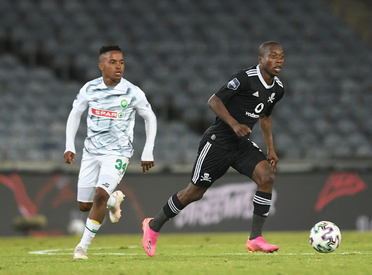 Siphesihle Maduna of AmaZulu challenges Ben Motshwari of Orlando Pirates during the DStv Premiership 2020/21 match between Orlando Pirates and AmaZulu.