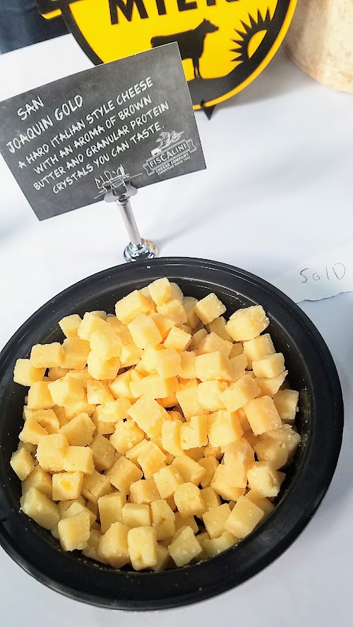 At the California Artisan Cheese Festival 2018 Artisan Cheese Tasting and Marketplace, Fiscalini Cheese San Joaguin Gold, a hard style Italian style cheese with an aroma of brown butter and granular protein crystals