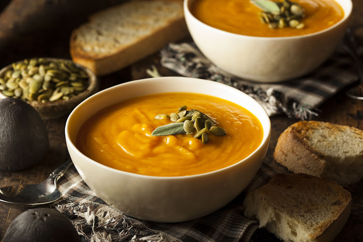 Dress up a packet of readymade butternut soup by garnishing it with pumpkin seeds and some fresh sage.