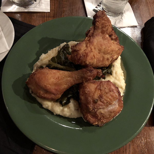 Gluten free fried chicken, mashed potatoes and collard greens.