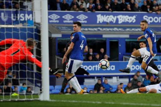 Arsenal's Alexis Sanchez scores their fifth goal during a march against Everton on October 22,2017./REUTERS