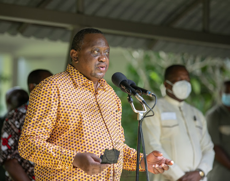 President Uhuru Kenyatta at the Kenya Medical Research Institute (KEMRI)-Wellcome Trust Station in Kilifi County