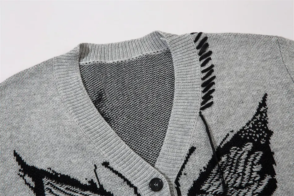 Trendy cardigan sweater met vlinder jacquard design en touw. Een stijlvolle en warme dames trui, ideaal voor een chique en modieuze look.