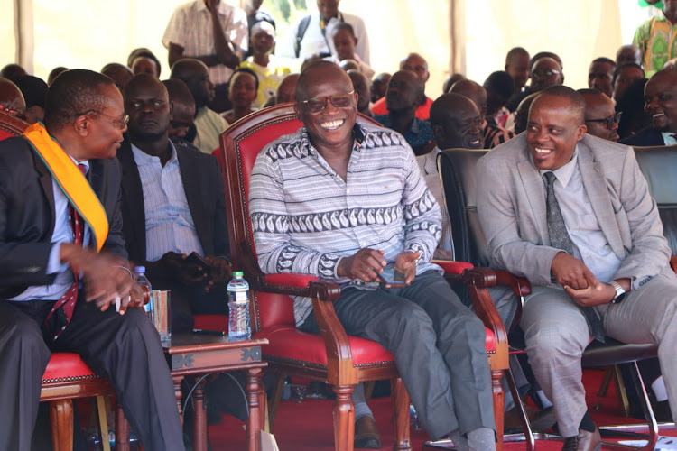 Governor Paul Otuoma, his deputy Arthur Odera and county assembly speaker Fredrick Odilo during the Madaraka Day celebrations in Amagoro Primary School in Teso North on June 1, 2023.