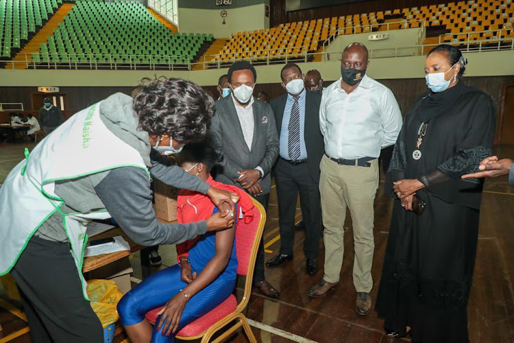 Sports CS Amb. Amina Mohamed when she presided over the nationwide vaccination program of sportsmen and women.