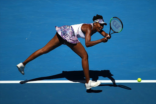 Venus Williams of the United States plays a backhand in her quarterfinal match against Anastasia Pavlyuchenkova of Russia on day nine of the 2017 Australian Open at Melbourne Park on January 24, 2017 in Melbourne, Australia. (Photo by Cameron Spencer/Getty Images)