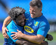 Veteran Springboks hooker Schalk Brits (R) with fellow hooker and teammate Scarra Ntubeni (R) during the captains run at Loftus in Pretoria on August 16 2019. 